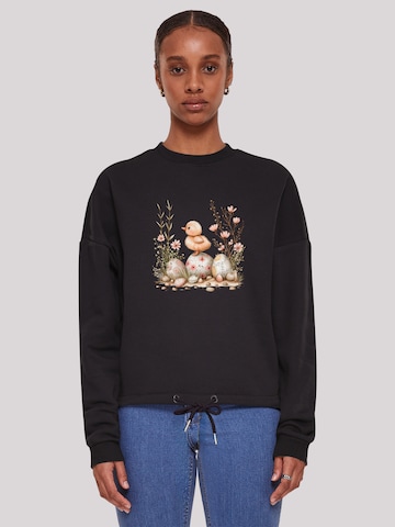 F4NT4STIC Sweatshirt 'Ostern Küken Ei Blumen' in Zwart: voorkant