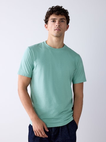 T-Shirt Next en vert : devant