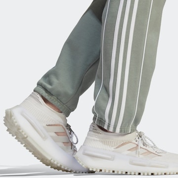 ADIDAS ORIGINALS Tapered Broek 'Rekive' in Groen