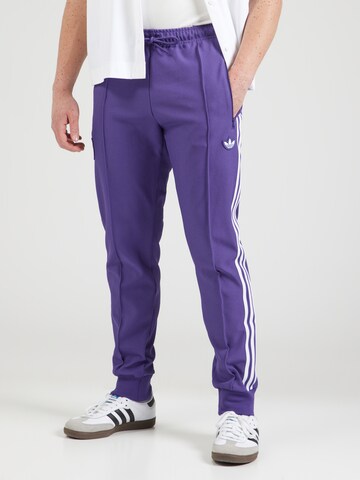 ADIDAS PERFORMANCE Zwężany krój Spodnie sportowe w kolorze fioletowy: przód