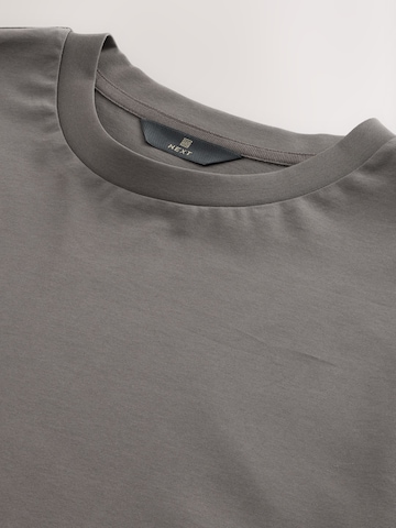T-Shirt Next en gris