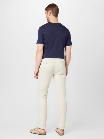 TOMMY HILFIGER Slimfit Chino kalhoty 'DENTON' – béžová