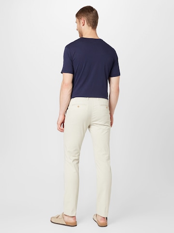 TOMMY HILFIGER Slim fit Chino trousers 'DENTON' in Beige