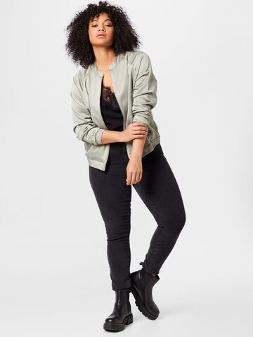 ABOUT YOU Curvy Přechodná bunda 'Chani' – zelená