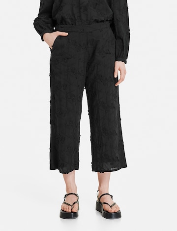 TAIFUN - Pierna ancha Pantalón en negro: frente
