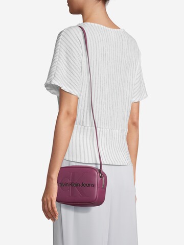 Calvin Klein Jeans Crossbody bag in Purple