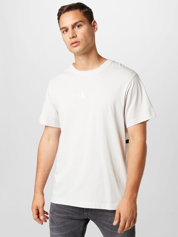 Calvin Klein Jeans Koszulka w kolorze szary: przód