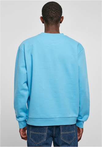 Sweat-shirt Karl Kani en bleu