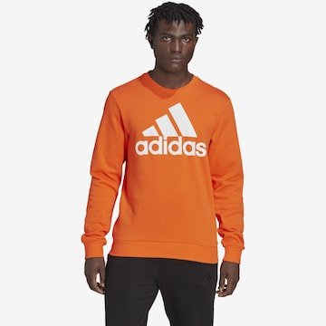 ADIDAS SPORTSWEAR Sport sweatshirt 'Essentials' i orange: framsida