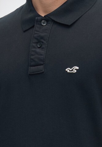 Tricou 'JUL4 INTL EXCLUSIVE' de la HOLLISTER pe negru