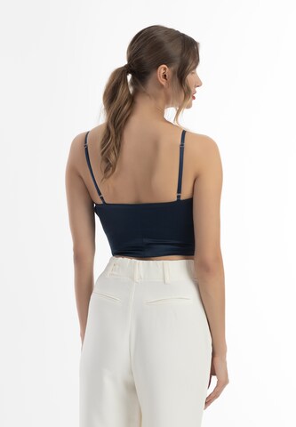 Top di faina in blu