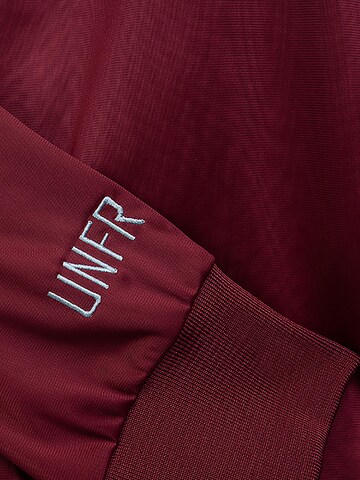 Unfair Athletics Training Jacket 'Tracktop' in Red