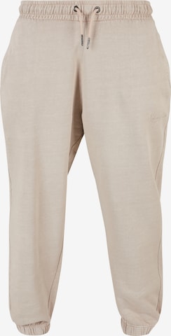 Effilé Pantalon Karl Kani en beige : devant