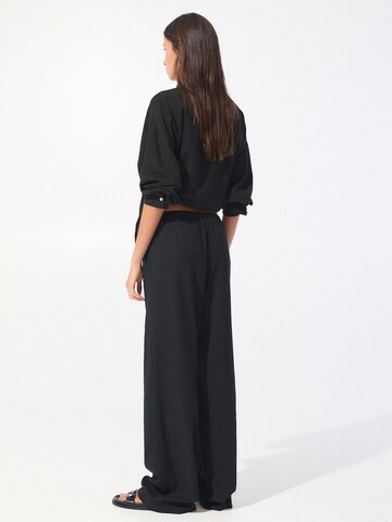 Wide leg Pantaloni di Pull&Bear in nero
