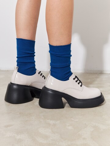 CESARE GASPARI Athletic Lace-Up Shoes in White