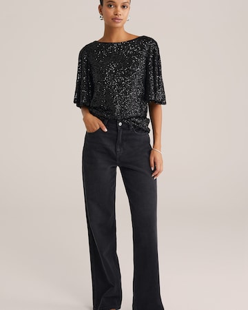Top de la WE Fashion pe negru