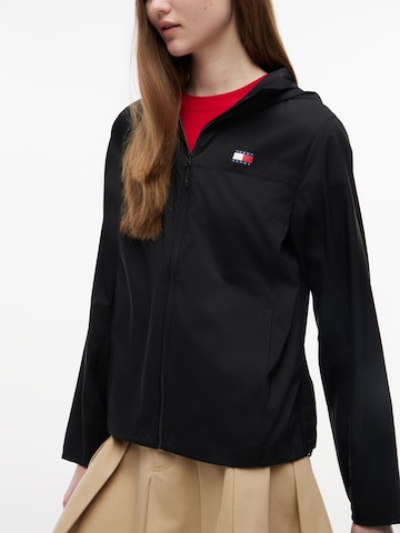 Tommy Jeans Демисезонная куртка 'Tommy Badge Ripstop Slim' в Черный