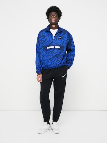 juoda Nike Sportswear Siaurėjantis Kelnės 'CLUB'