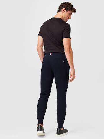 Tapered Pantaloni di TOMMY HILFIGER in nero