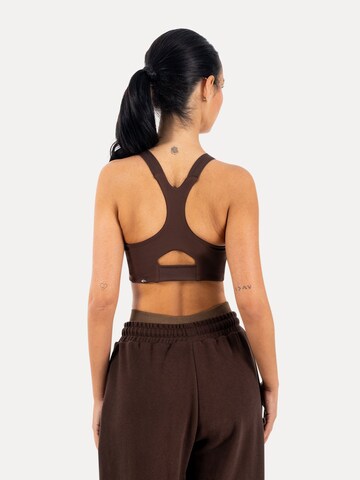 Smilodox Sporttop in Bruin