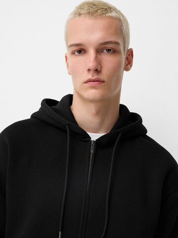 Giacca di felpa di Bershka in nero
