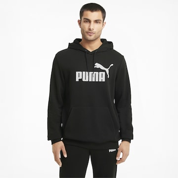 PUMA Spordidressipluusid 'Essentials', värv must: eest vaates