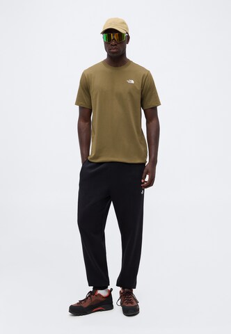 Tapered Pantaloni 'EVOLUTION SIMPLE DOME' di THE NORTH FACE in nero