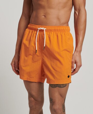 Shorts de bain Superdry en orange