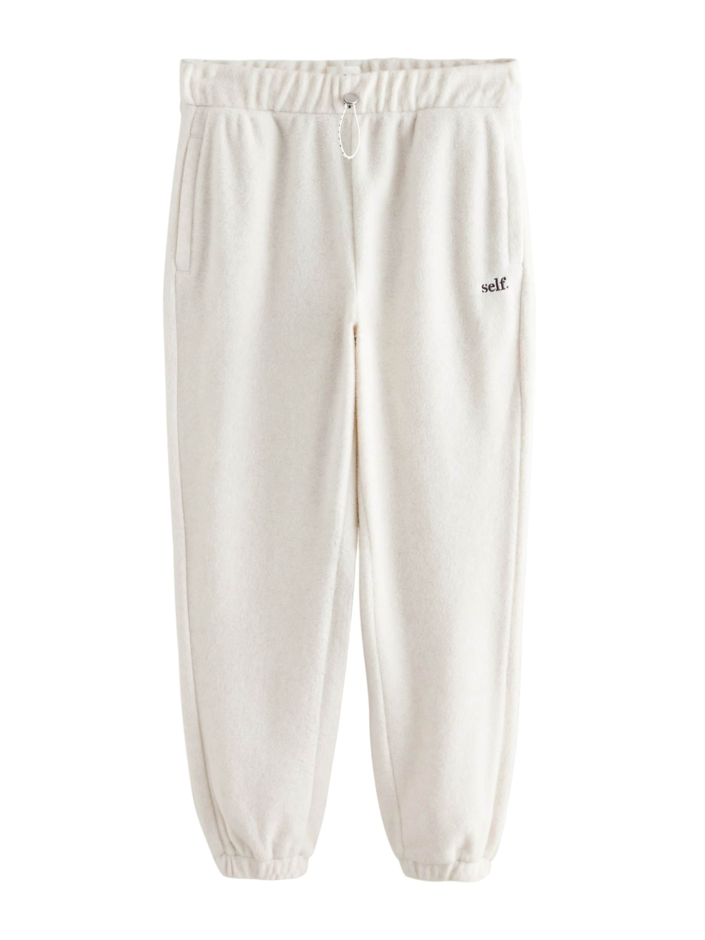 self. Tapered Trousers in Beige: front