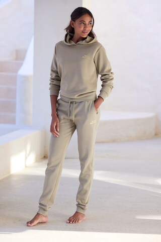 LASCANA - Tapered Pantalón en verde