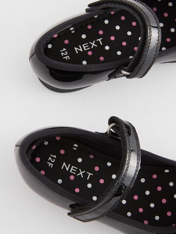 Next - Bailarina en negro