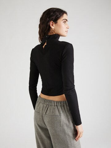 Maglietta di Gina Tricot in nero