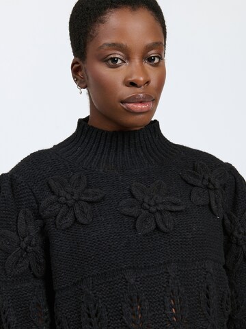 Influencer - Jersey en negro