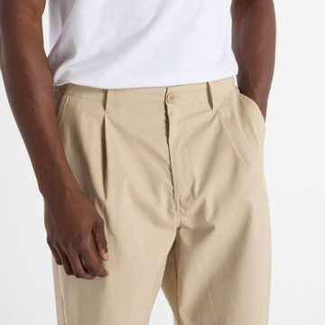 Loosefit Pantalon à pince 'Athletics' new balance en gris
