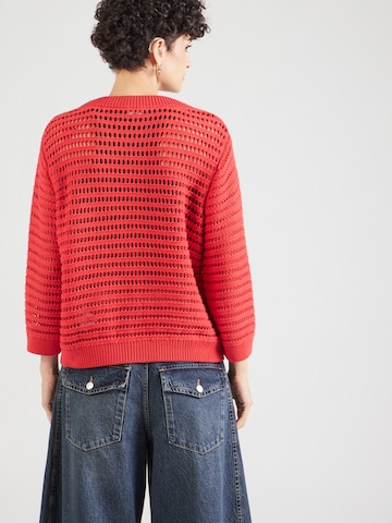 Pullover di monari in arancione