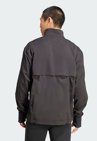 ADIDAS PERFORMANCE Training jacket 'Own The Run' in Black