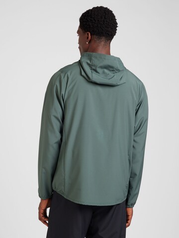 NIKE Trainingsjacke 'FORM' in Grün