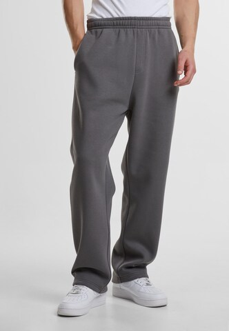 Urban ClassicsLoosefit Hlače - siva boja