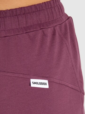 Effilé Pantalon de sport 'Althea' Smilodox en violet
