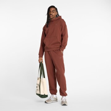 Sweat de sport new balance en rouge : devant