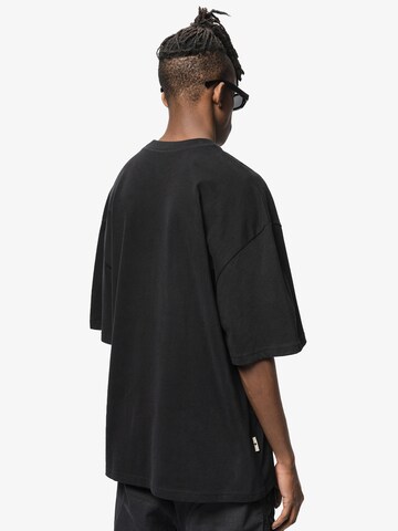 Pequs T-Shirt 'Artist or Killer' in Schwarz
