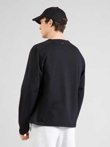 NIKE Koszulka funkcyjna 'Primary' w kolorze czarny