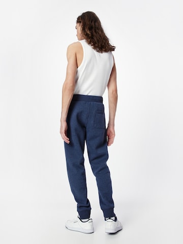 Superdry Tapered Broek 'Essential' in Blauw