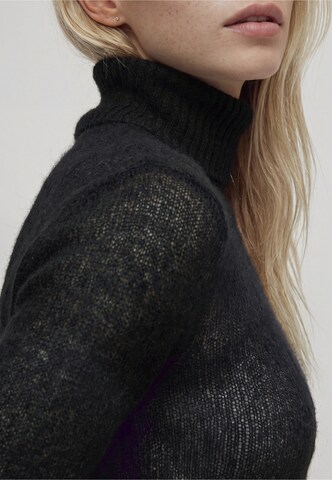 Pull-over REPLAY en noir : sur le côté