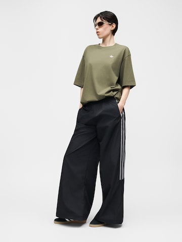 ADIDAS ORIGINALS - Perna larga Calças 'Teamgeist' em preto