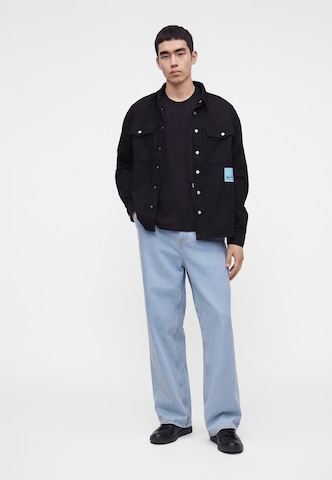 KARL LAGERFELD JEANS Övergångsjacka 'KLJ x Pietro Terzini' i svart