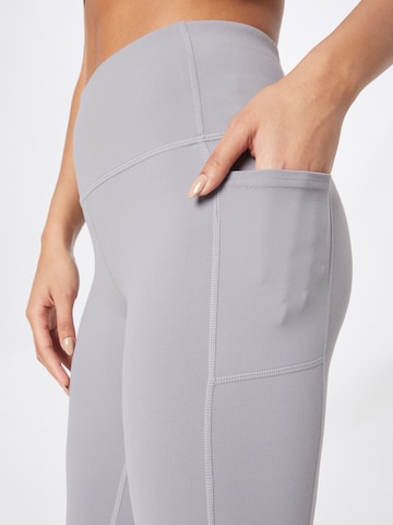 Skinny Pantalon de sport SKECHERS en gris