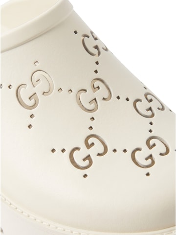 Gucci - Zuecos en beige