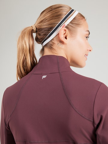 Fabletics Sportovní bunda 'STORM' – červená