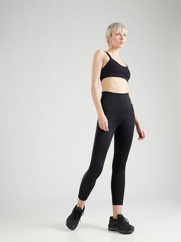 NIKE Skinny Sporthose in Schwarz